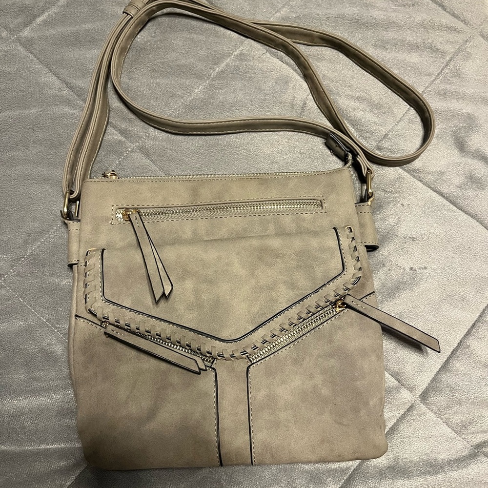 Maurices Tanish Green Crossbody Bag with Adjustable Strap and Distinctive Design